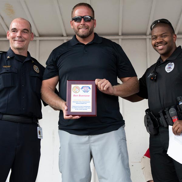 ben with two police officers